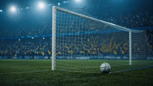 Illustration of a soccer ball resting in the corner of a rain-soaked goal under blue-tinted stadium lights