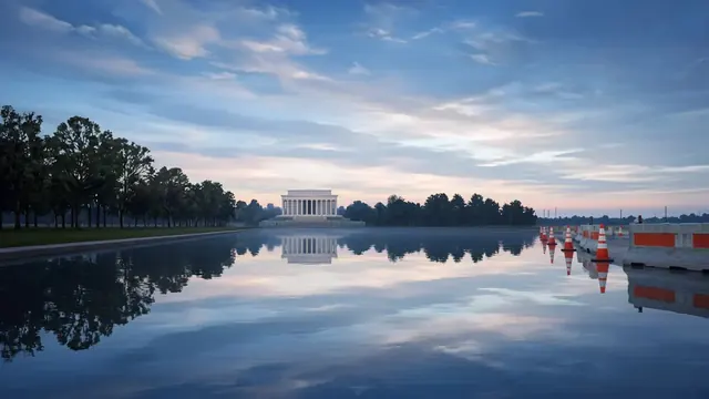 Illustration of a long reflecting pool at dawn with a columned memorial in the distance and traffic cones along one edge