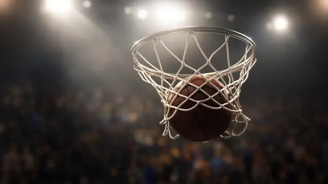 Illustration of a basketball swishing through a net under bright arena lights with a blurred crowd in the background