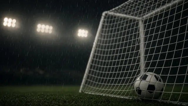 Illustration of a soccer goal net in the rain at night, with a ball in the corner of the net and stadium lights blurred behind