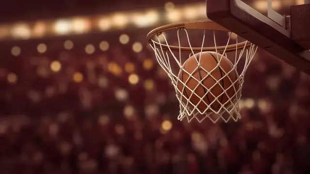 Illustration of a basketball dropping through a net in a packed, softly lit arena, with players shown only as blurred silhouettes